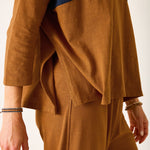 Brown outfit with a navy stripe on a white background