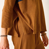 Brown outfit with a navy stripe on a white background