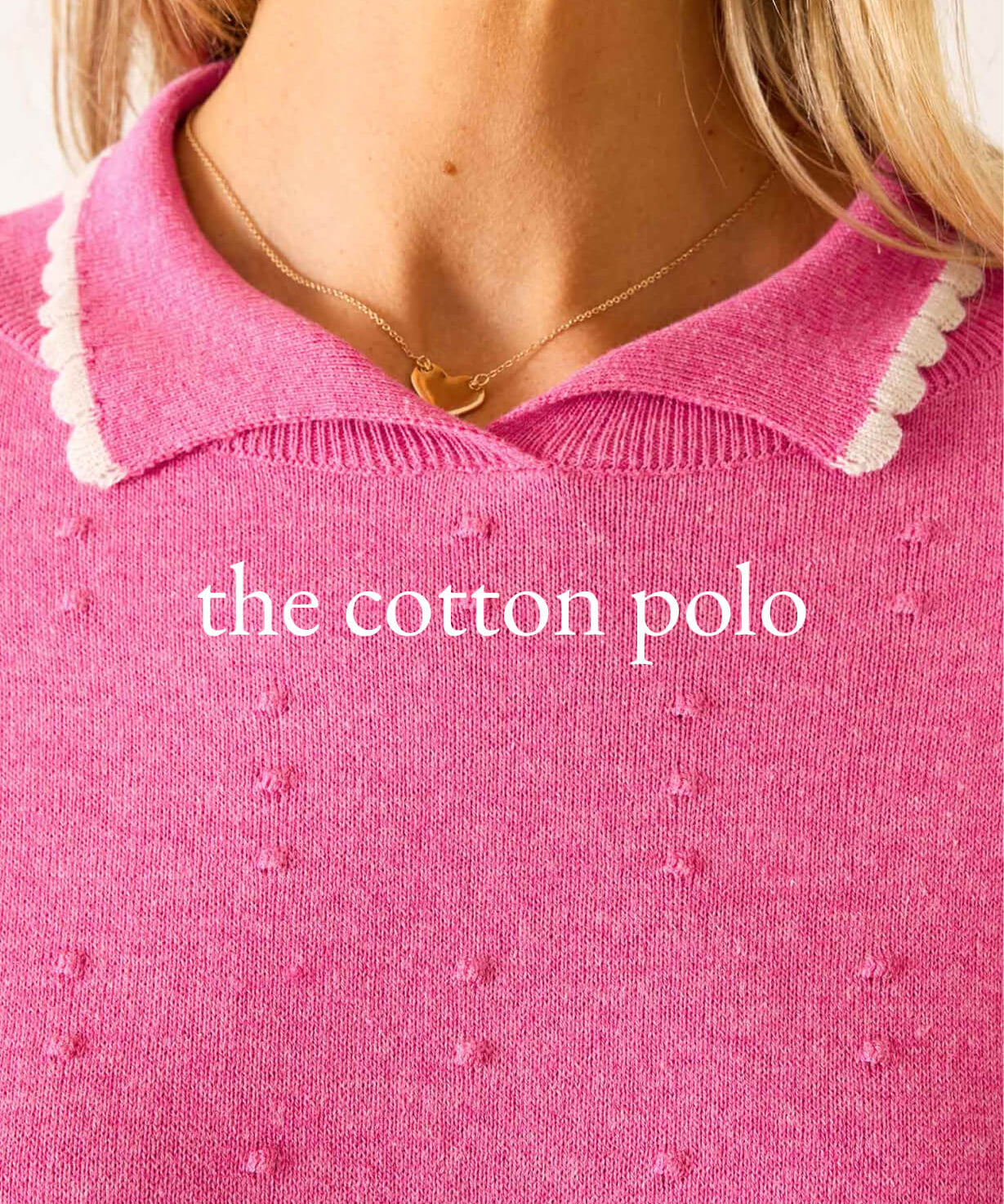 Close-up of a pink polo shirt with 'the cotton polo' text.