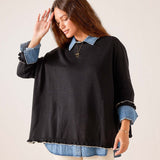 Black and taupe ruffled oversized sweater with denim collar and cuff details.