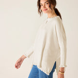 MERSEA ladies' travel-ready warm white ruffle knit sweater with a tiered hem and lace-trimmed edges.