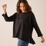 Black relaxed fit linen-blend ruffled tee with split side seams.
