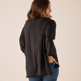 Black ruffle tee with billowy sleeves and gathered hem