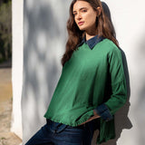 Fairway green ruffle tee with a layered look and denim collar detail.