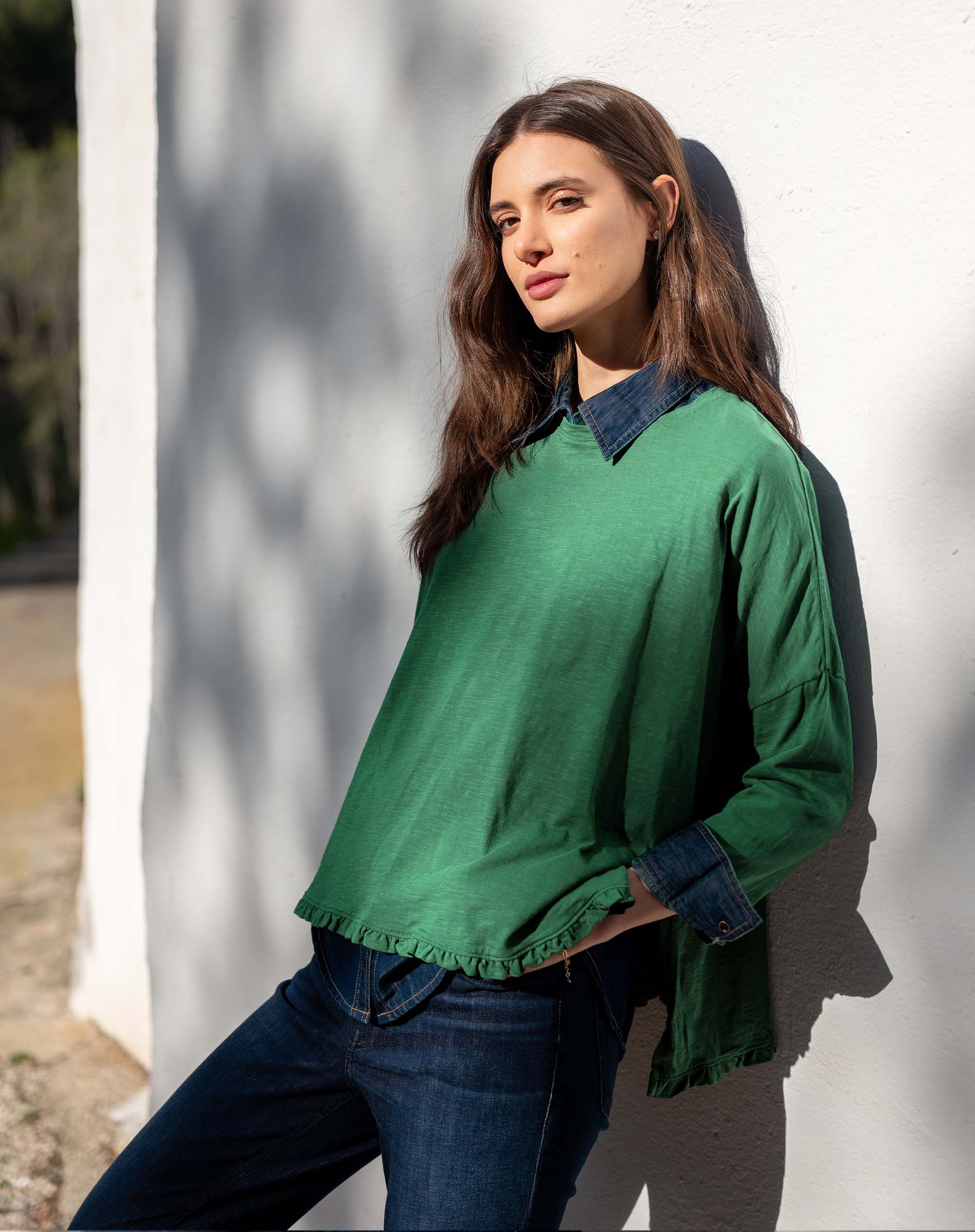 Fairway green ruffle tee with a layered look and denim collar detail.
