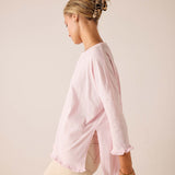 side view of women's travel-friendly rose quartz relaxed-fit cotton-blend t-shirt with ruffled hem and sleeves