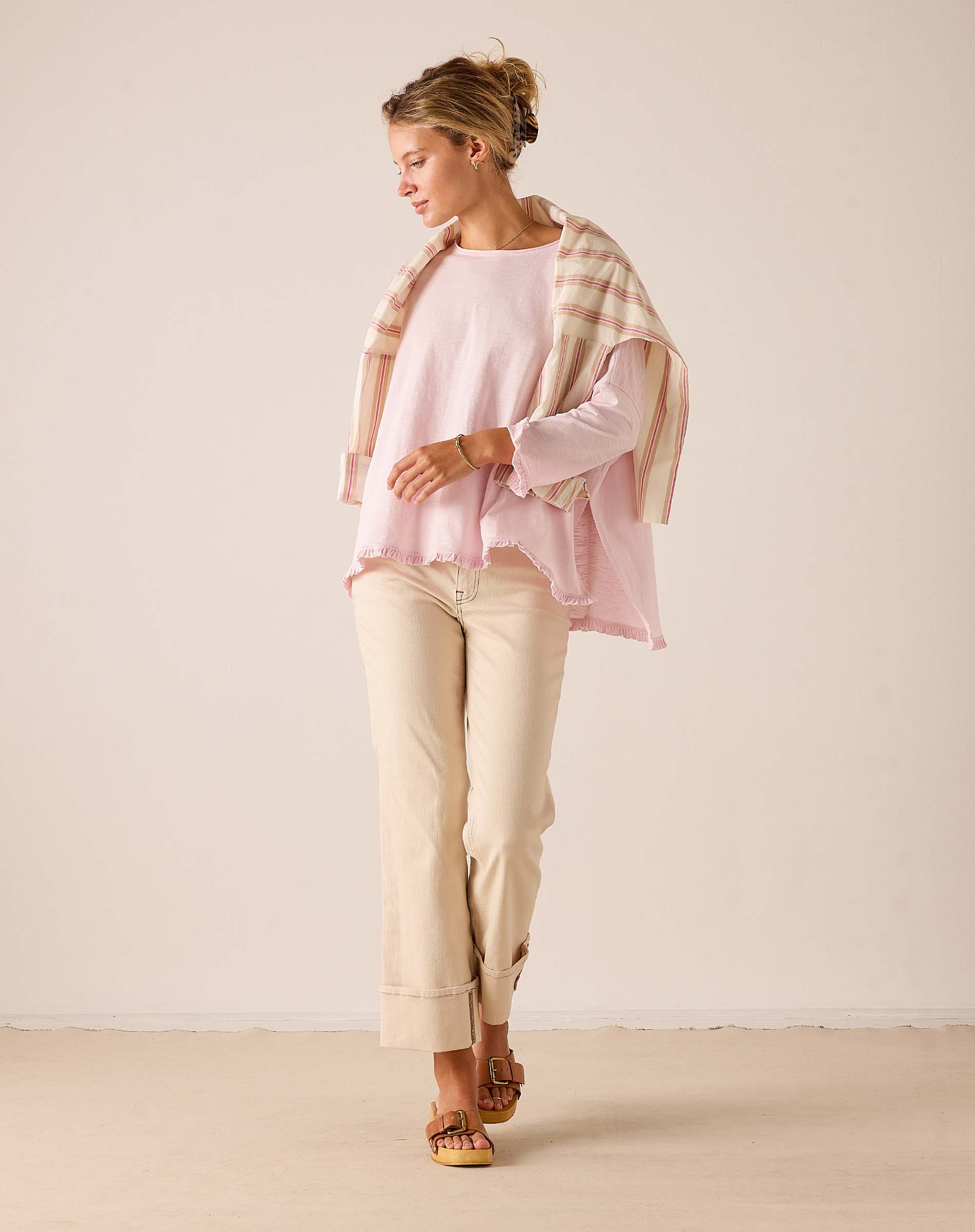 Rose quartz ruffled tee in soft knit fabric.