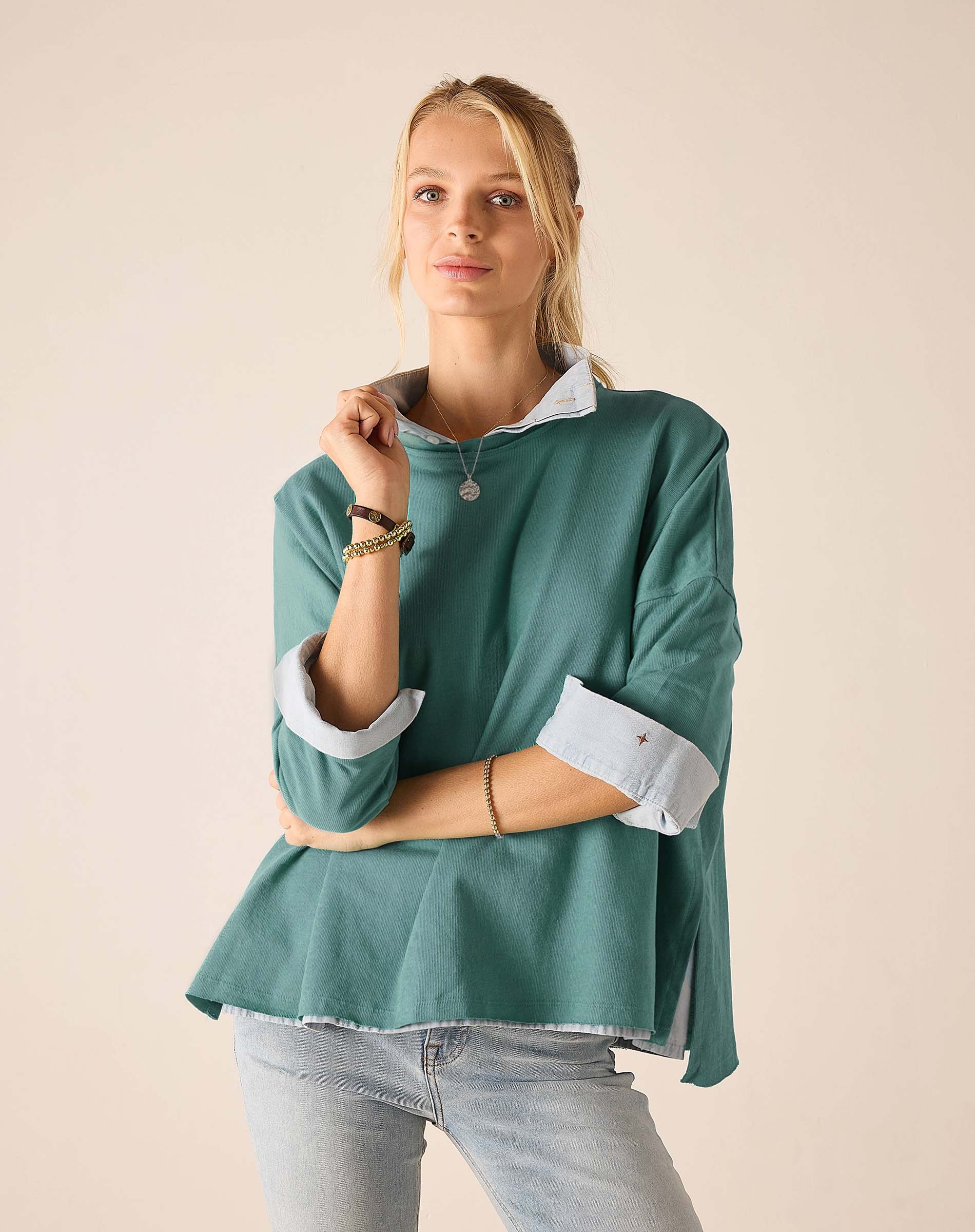Aqua blue oversized tee with white contrast collar and cuffs in a soft linen blend.