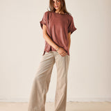 MERSEA women's travel-friendly burnt brick short-sleeve knit top with ruffle detailing on the sleeves.