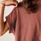 Burnt brick short-sleeve knit sweater with a ruffled edge and textured weave.