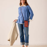 Indigo sunwashed oversized t-shirt with layered collar and relaxed fit.