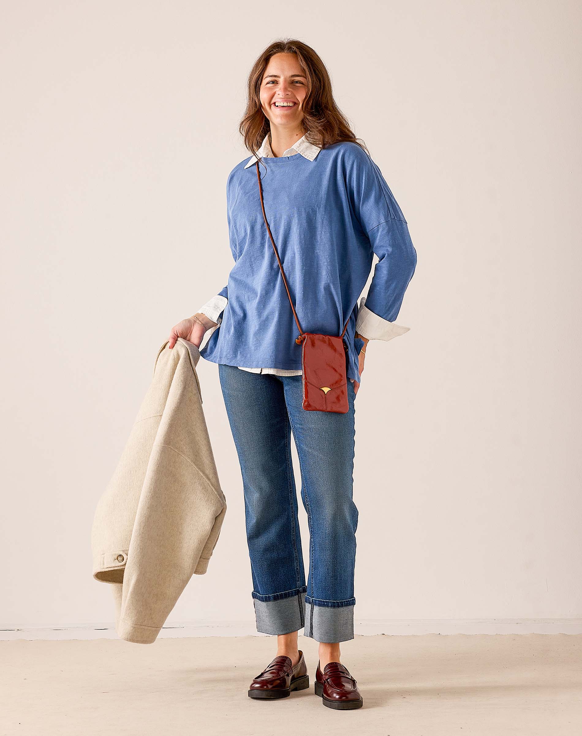 Indigo sunwashed oversized t-shirt with layered collar and relaxed fit.