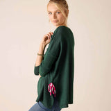Ladies' travel-ready forest green relaxed-fit knit sweater with drawstring tie detail