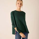 Forest green oversized knit sweater with a relaxed fit and soft knit texture.