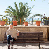 Women's travel-friendly putty colored oversized turtleneck knit sweater.