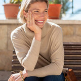 Putty color ribbed knit Catalina turtleneck sweater with a cozy fold-over neck.