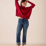 Ladies' travel-ready wine red oversized knit turtleneck sweater with a relaxed fit.