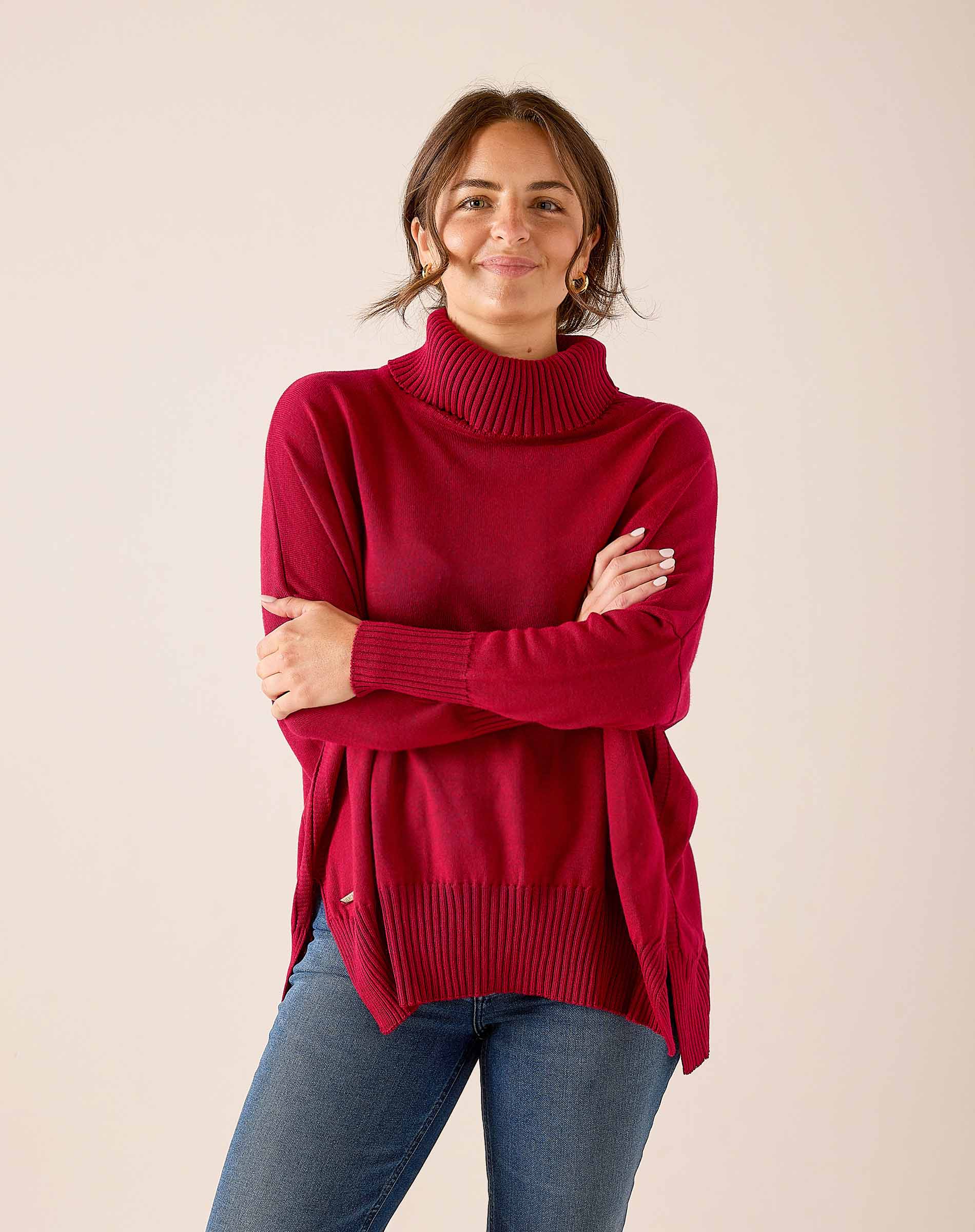 Wine colored oversized knit turtleneck sweater with ribbed detailing