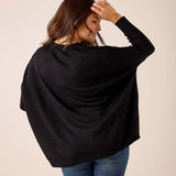 Black knit Catalina V-neck sweater with a relaxed fit.