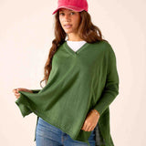 Emerald green v-neck knit sweater.