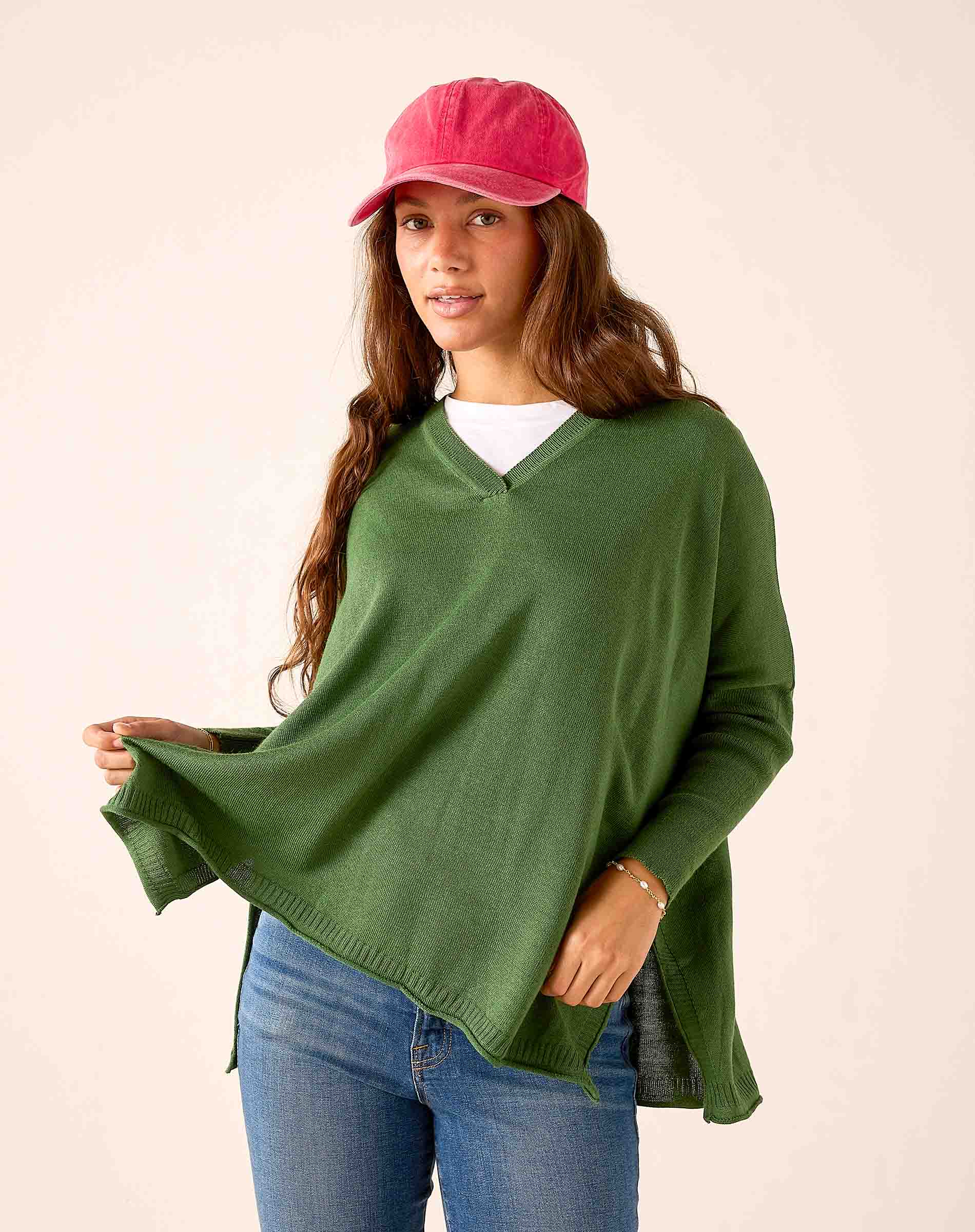 Emerald green v-neck knit sweater.