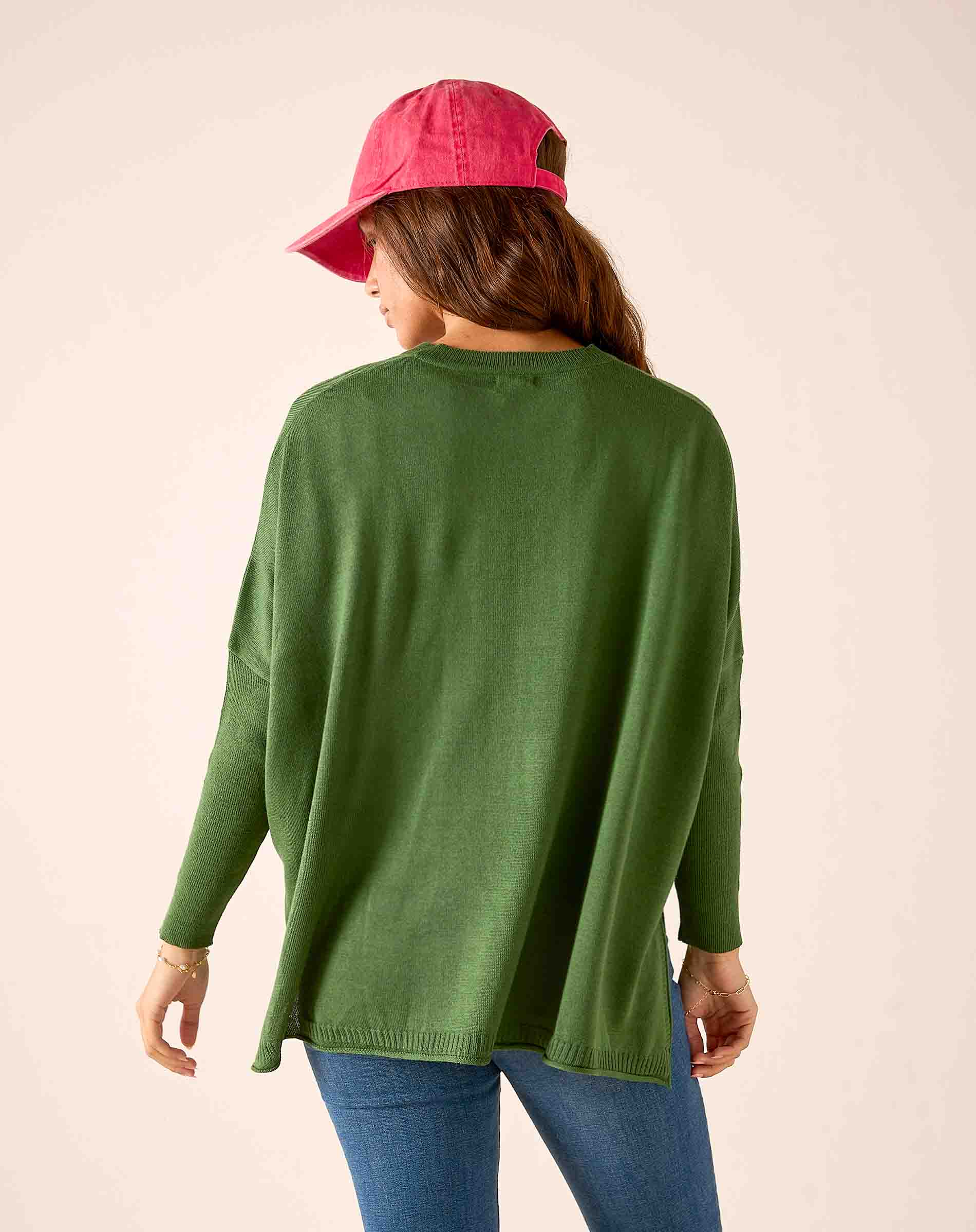 Emerald green knit V-neck sweater with a relaxed fit.