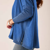 Ocean blue ribbed knit V-neck sweater with wide sleeves