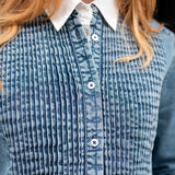 Stonewashed chambray tuxedo shirt with pleated front detail.