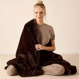 Ladies' travel-ready brown leopard print faux fur blanket.