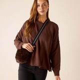 Leopard print faux fur crossbody bag in mocha brown.