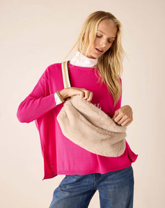 Oatmeal faux fur crossbody bag with a slouchy silhouette and wide shoulder strap.