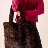 Leopard print faux fur tote bag.