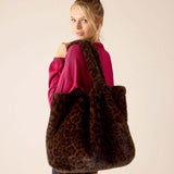 Leopard print faux fur tote bag.