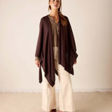 MERSEA women's travel-friendly chocolate brown wrap with a draped, oversized fit and flowing sleeves.