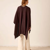 Back view of the chocolate wrap with a wide hem and draping fabric.