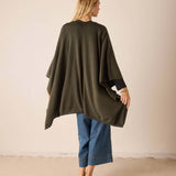 Back view of the olive wrap with a loose, draped silhouette and wide hem.