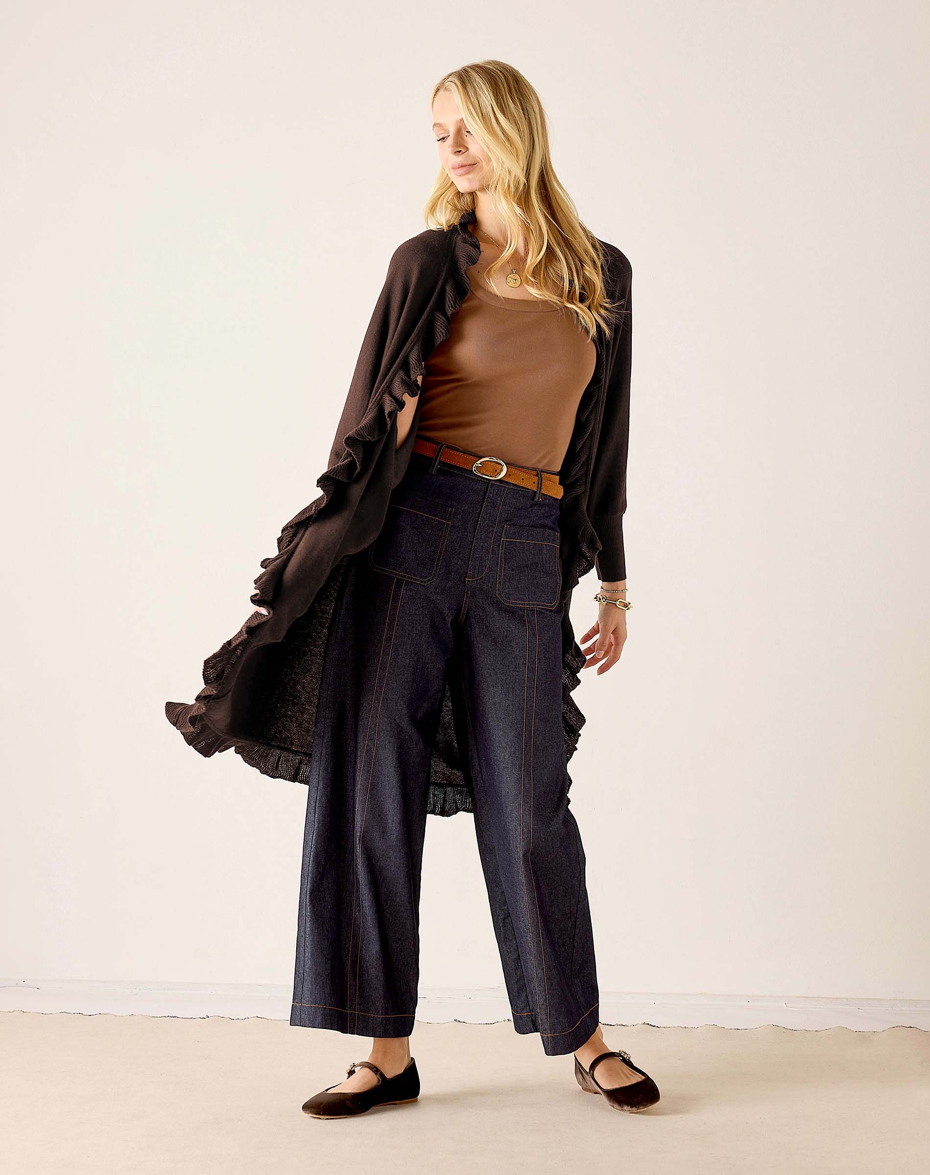 Women's travel-friendly chocolate brown ruffled kimono with wide leg trousers and belt.