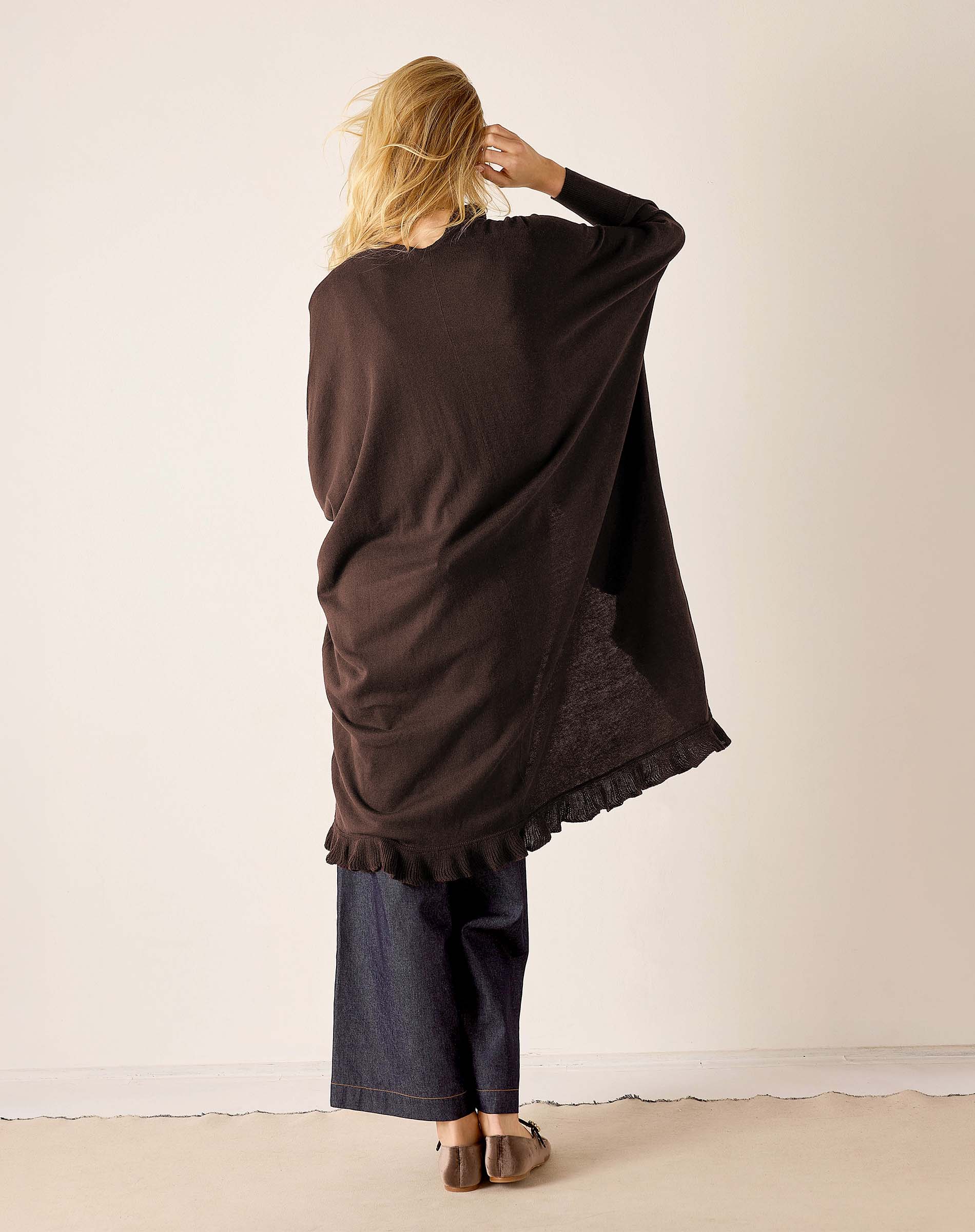 Chocolate brown ruffled kimono with wide sleeves and flared hem.