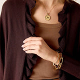 Chocolate brown ruffled kimono wrap featuring a ribbed knit texture and deep neckline.