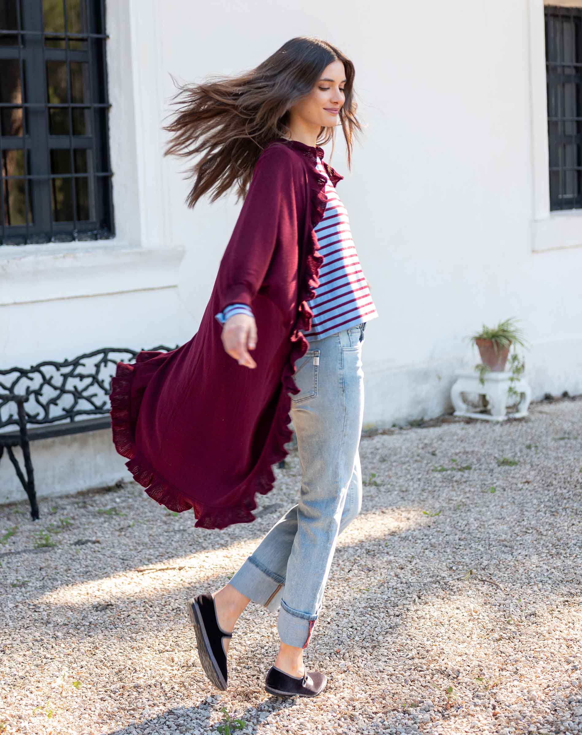 Wine-colored ruffled kimono wrap with a flowing silhouette and flared hem.