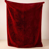 Garnet faux fur throw with a plush, voluminous pile.