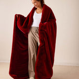 Garnet color oversized faux fur throw with soft plush finish.