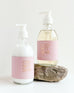 9 ounce mersea coconut sugar shea lotion and hand soap against white backdrop