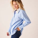 Bleu button-down shirt with a detachable lace-trimmed collar and ruffled cuffs.
