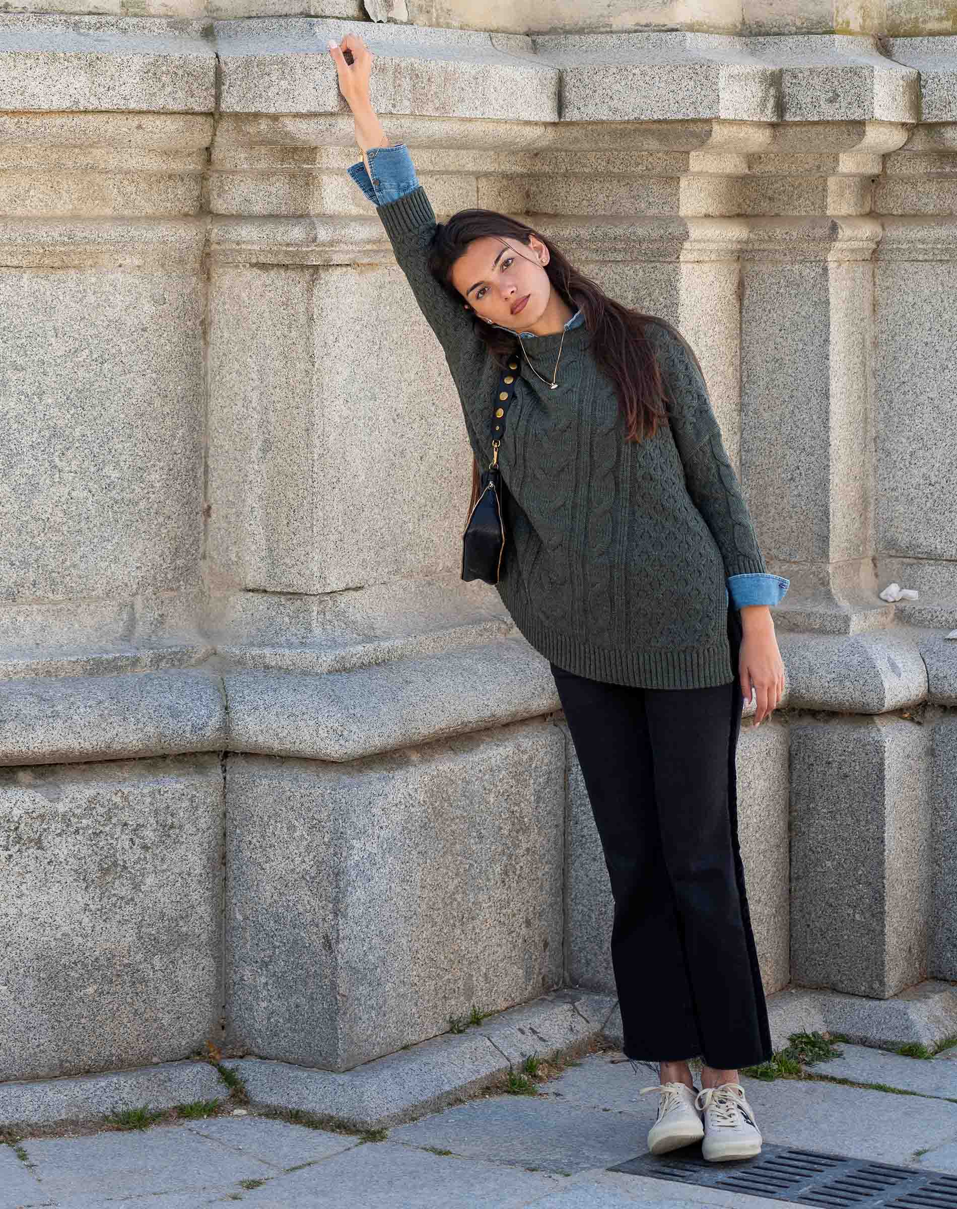 Ladies' travel-ready army green cable-knit oversized sweater with folded cuffs.