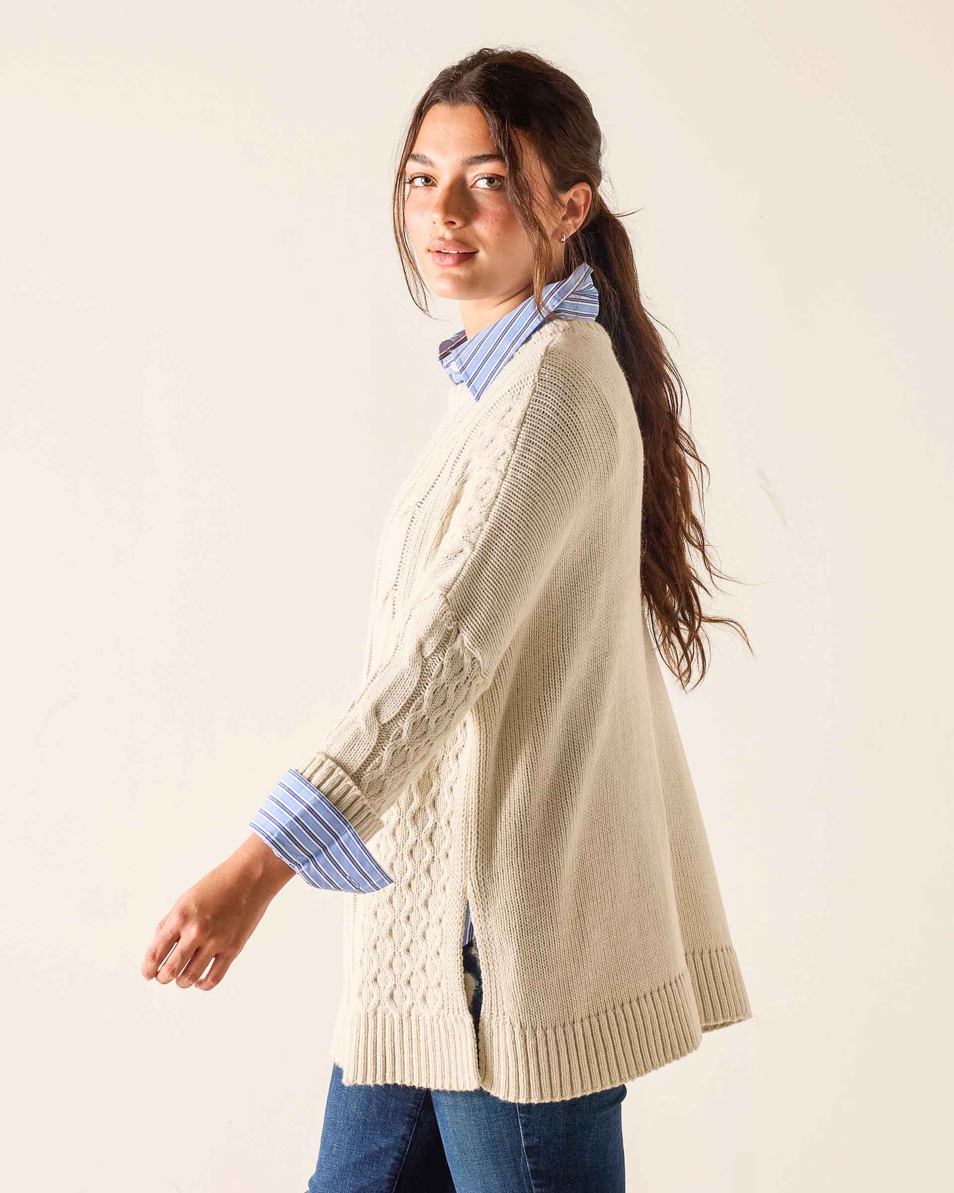 Sea Salt cream knit chunky-stitch oversized cardigan featuring a cable stitch pattern and ribbed hem.
