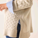 Sea salt knit cable stitch sweater featuring a textured knit pattern and dropped shoulders.