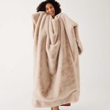 woman holding Mersea Cozy Cabin Faux Fur Throw Blanket in oatmeal