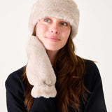 Oatmeal cream faux fur headband with a cozy aesthetic.