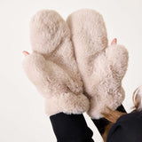 Oatmeal and cream faux fur mittens with a plush, cozy feel.